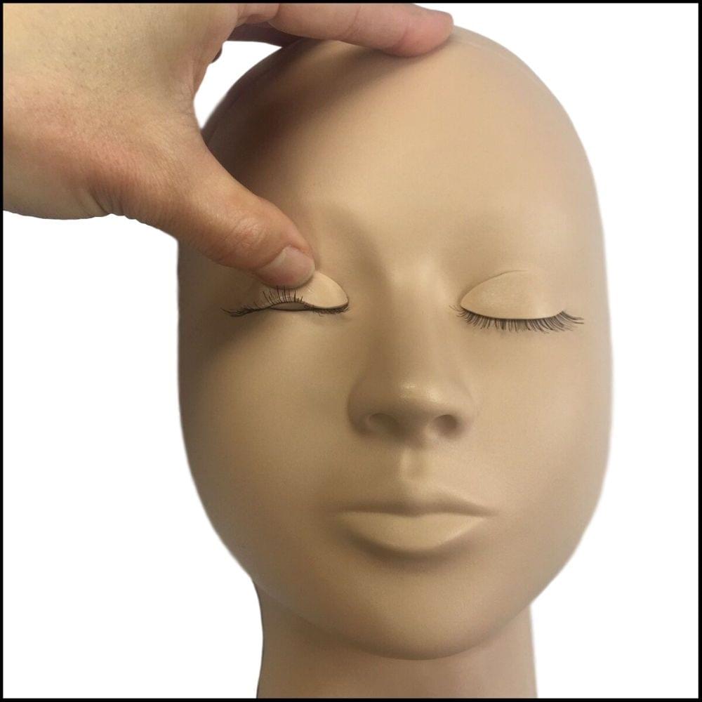 Thumb Pulling at the eyelid of a GLB Advanced Training Mannequin